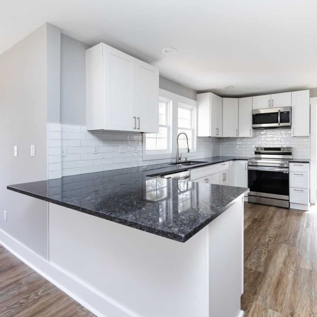 A_Chic_Kitchen_with_White_Cabinets_and_H_1