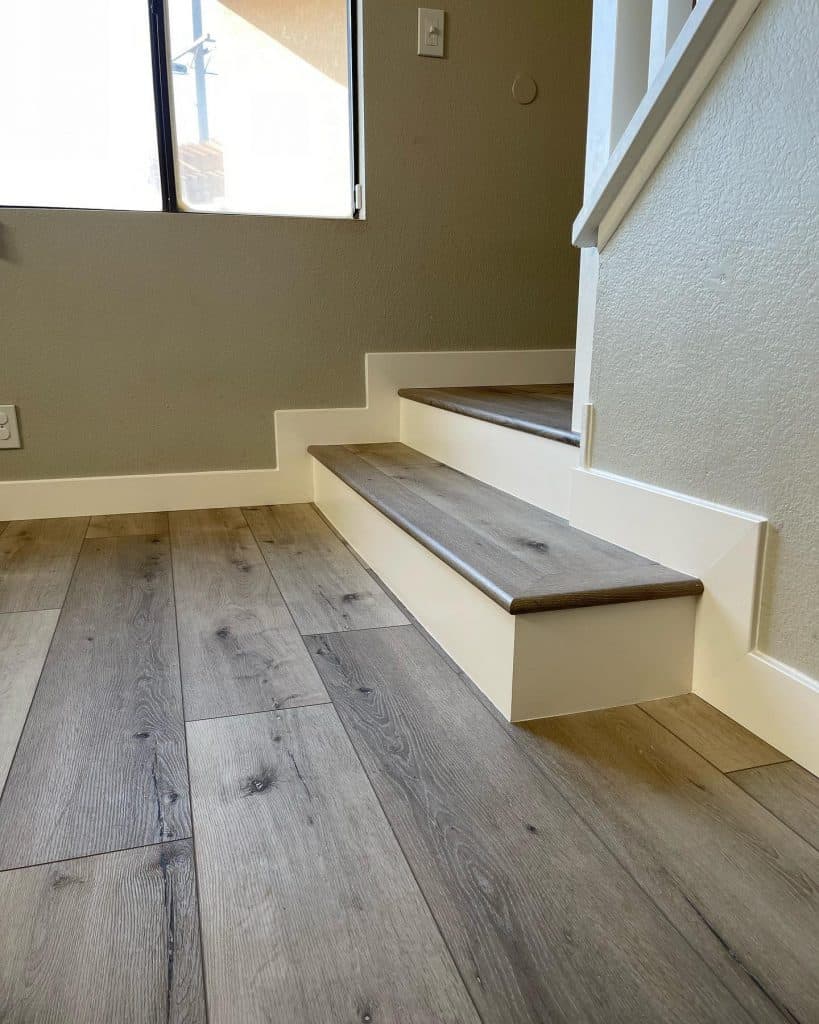 Charming_Foyer_with_Reclaimed_Wood_Stair_