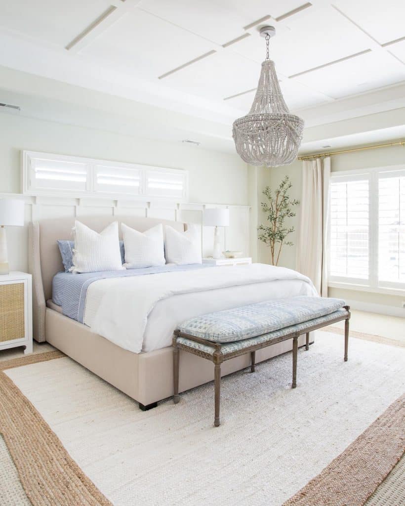 Chic_Coastal_Bedroom_with_Chandelier_and_