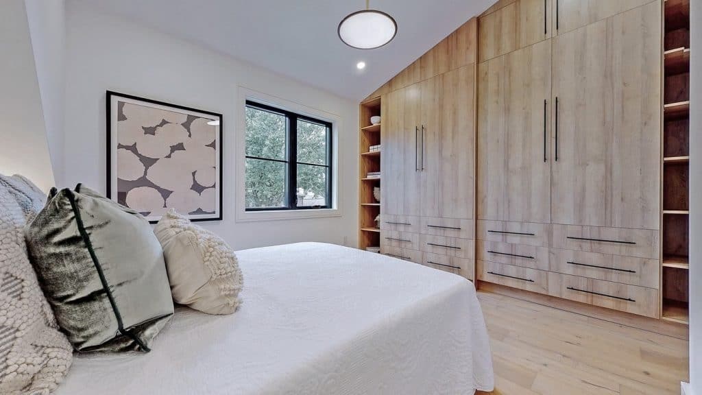 Elegant_Bedroom_with_Wooden_Cabinets_and_