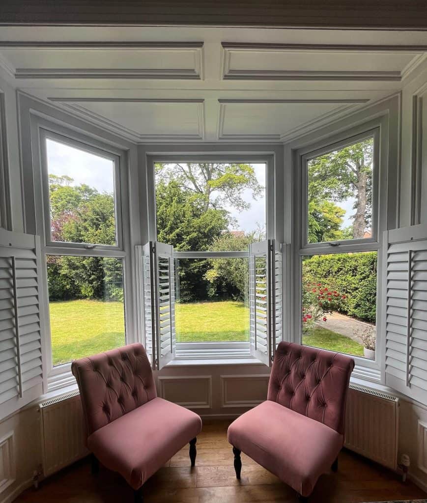 Pink_Chairs_by_the_Bay_Window_