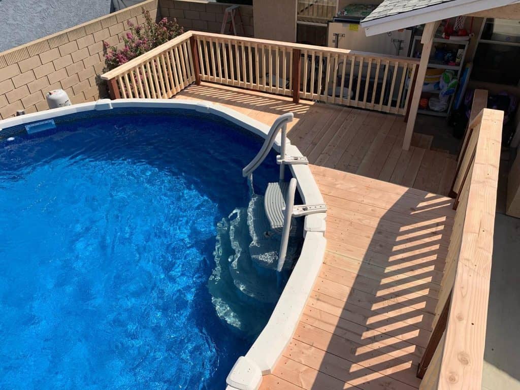 oval_above_ground_pool_with_deck_