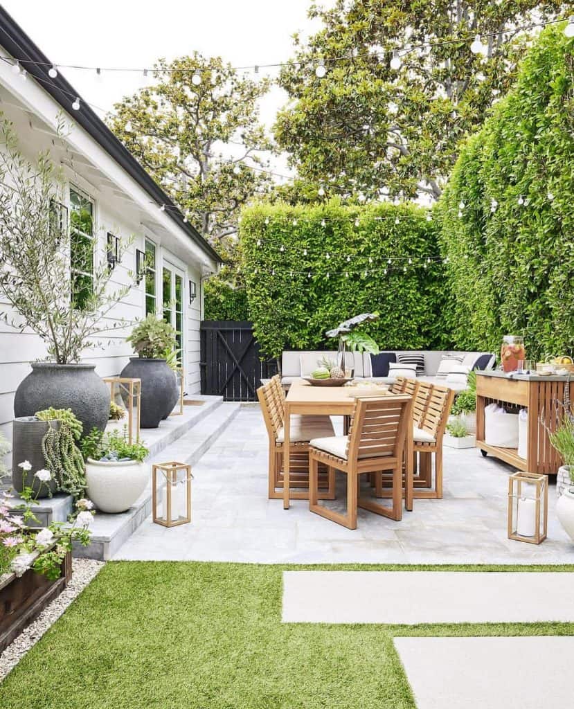 A_Backyard_Patio_With_Wooden_Furniture_a_