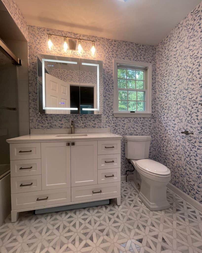 A_Chic_Blue_and_White_Bathroom_with_Gorg_