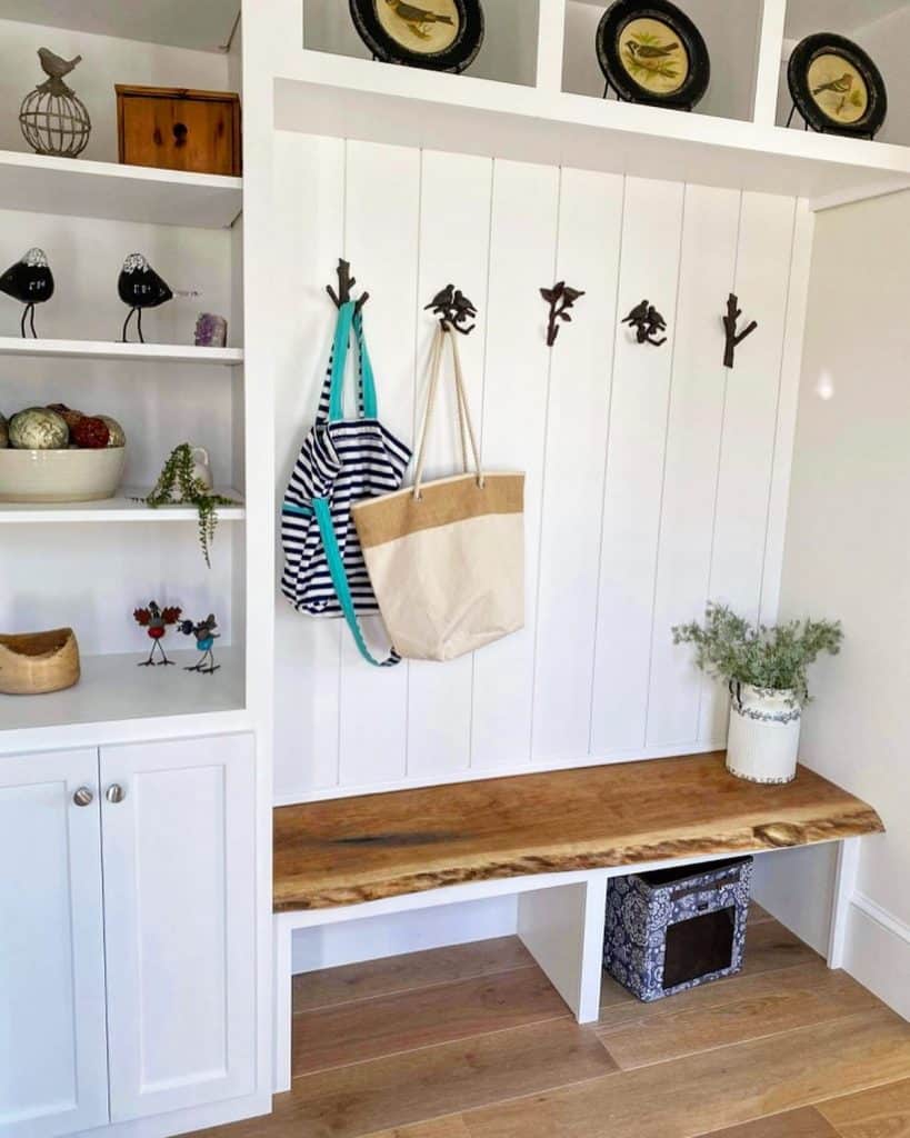 A_Chic_White_Entryway_with_a_Wooden_Benc_2