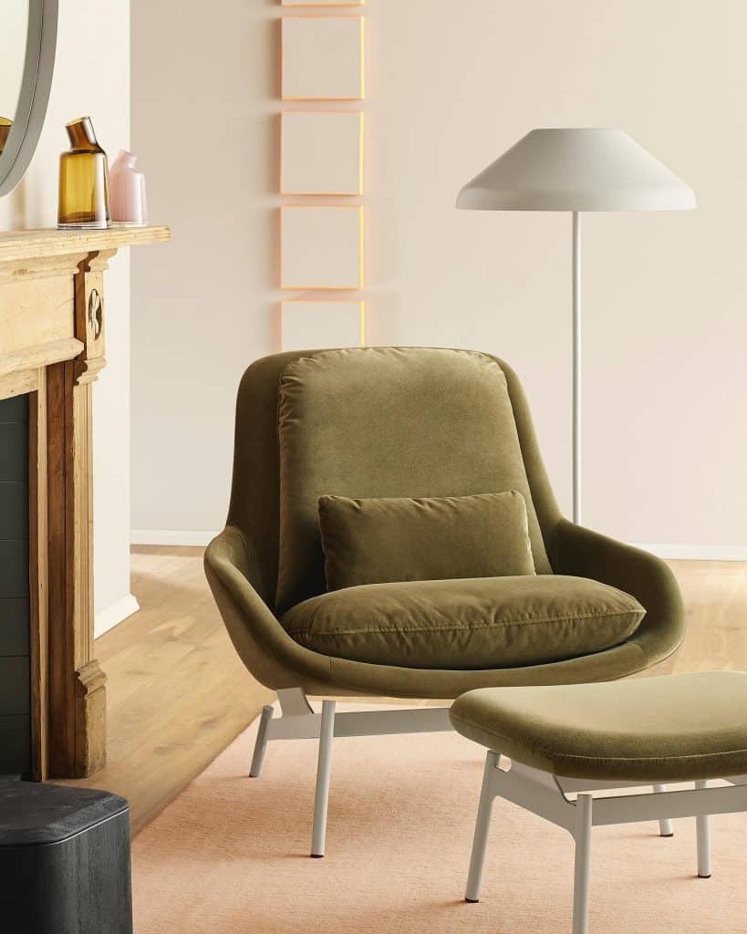 A_Green_Velvet_Chair_and_Ottoman_in_Fron_6