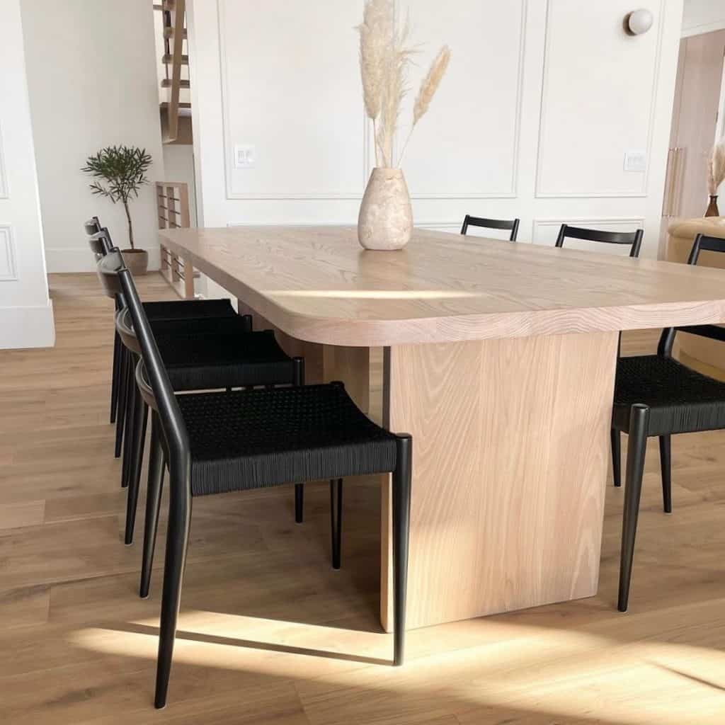 A_Neutral-Toned_Dining_Room_with_a_Woode_4