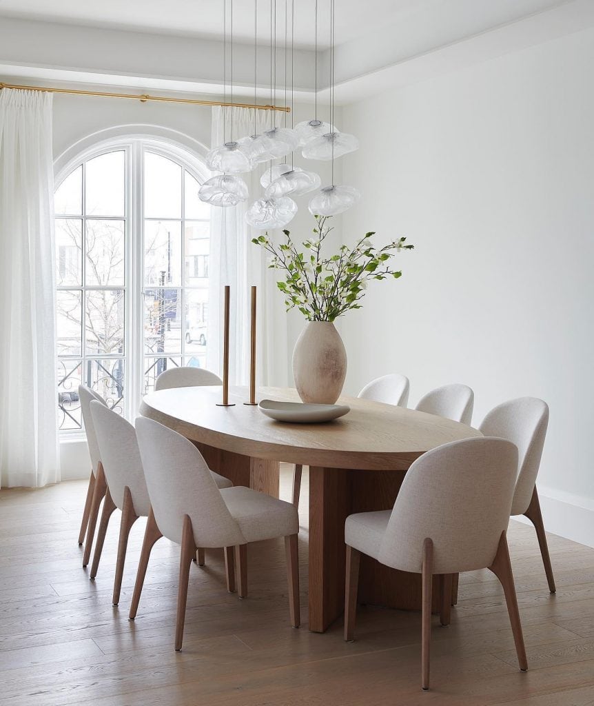 A_Neutral_Dining_Room_With_White_Chairs__4