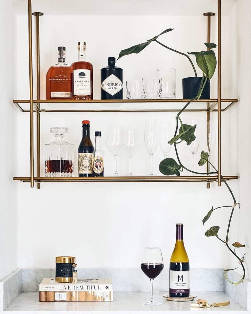 Chic_Brass_Bar_Shelves_Adorned_With_Gree_4