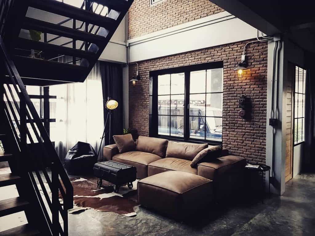 Cozy_Living_Space_with_Rustic_Brick_Wall_1