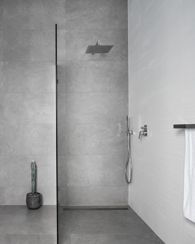 Minimalist_Walk-In_Shower_with_Sleek_Gra_