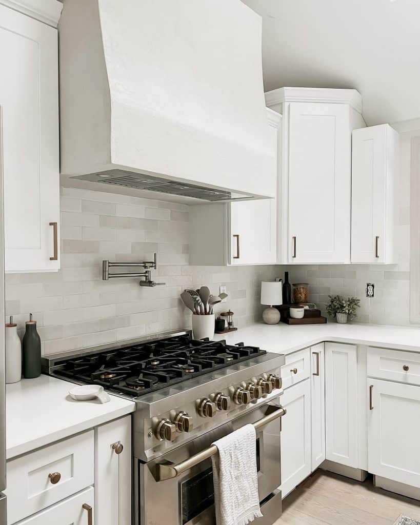 Sleek_and_Modern_White_Cabinets_and_Sta_2