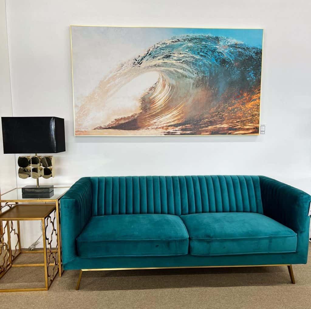 Teal_Velvet_Couch_Paired_with_Artistic_W_