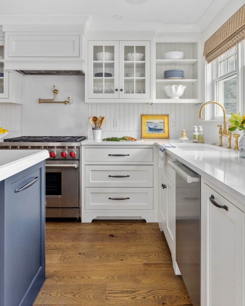 A_Kitchen_with_Blue_Center_Island_and_Wh_1