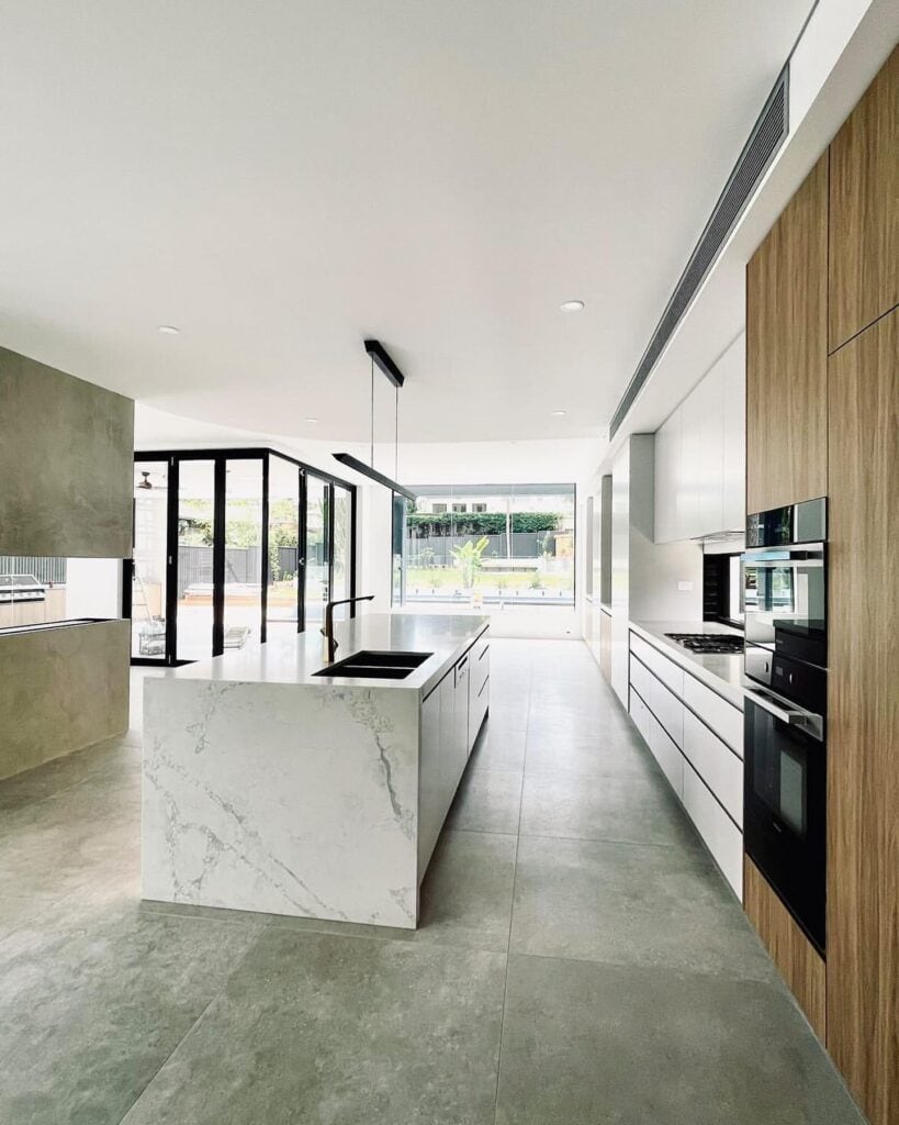 A_Modern_Kitchen_With_a_Striking_Waterfa_1