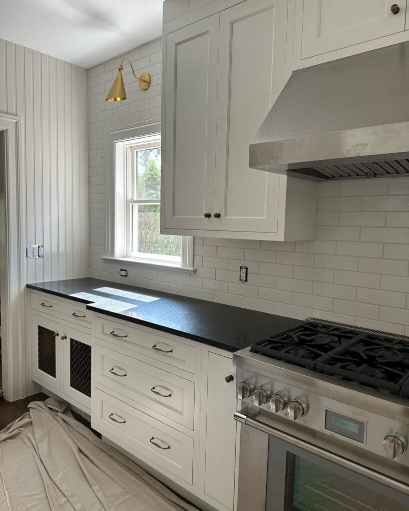 black_countertop_with_white_cabinets_2