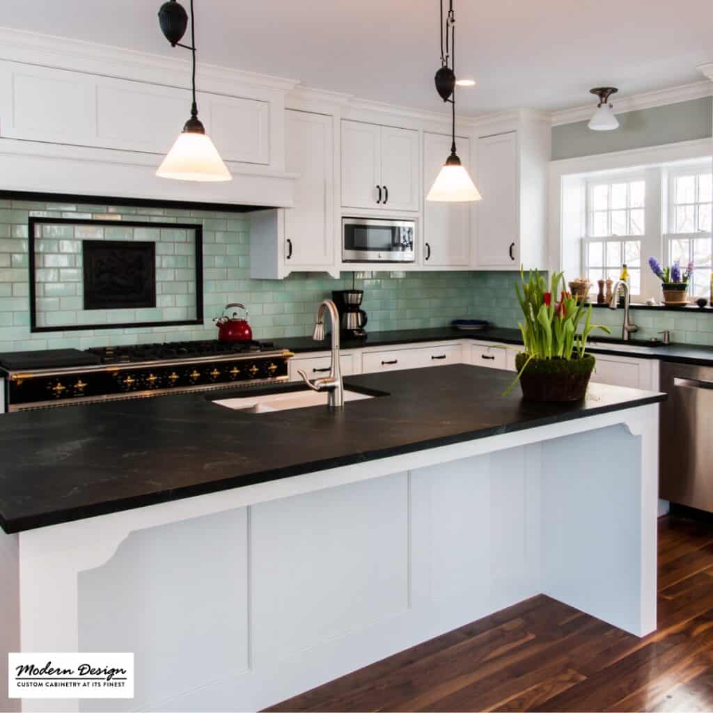 kitchen_with_white_cabinets_and_black_countertops_2