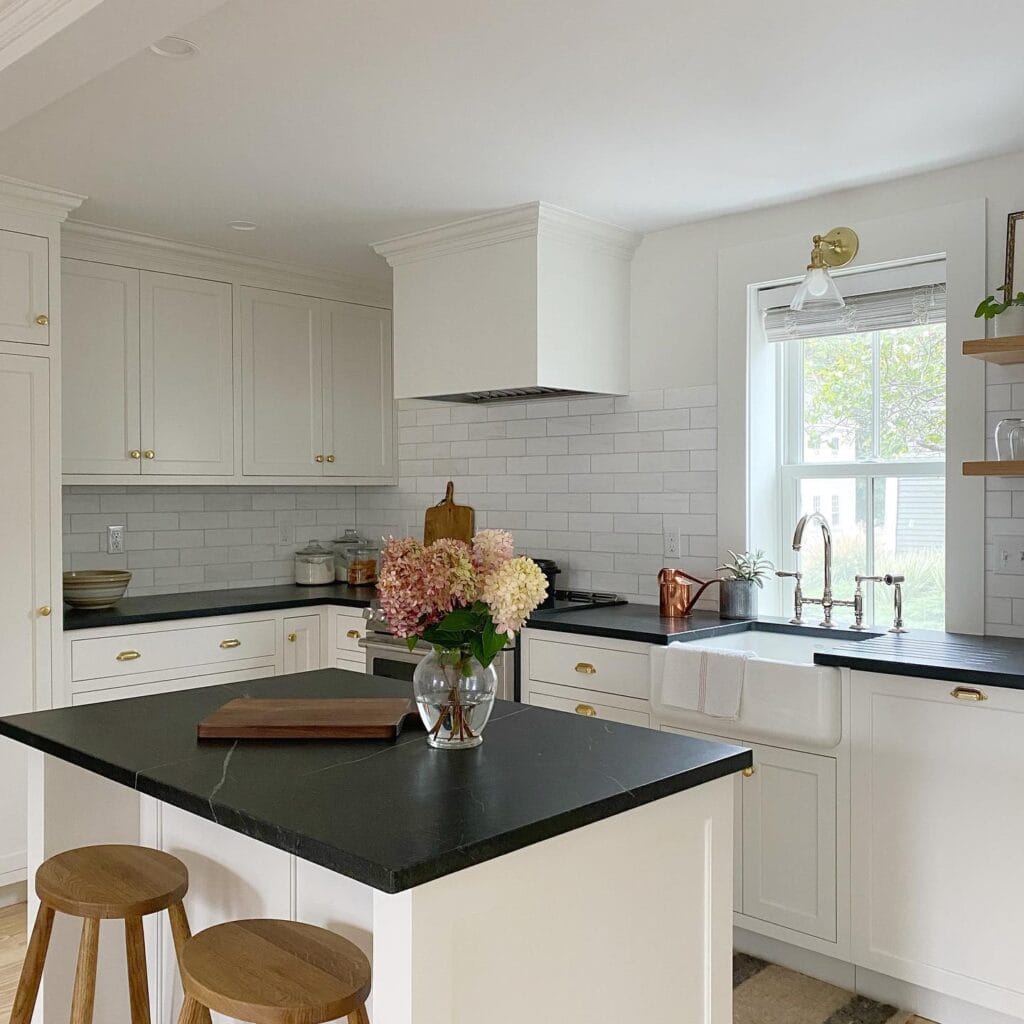 kitchen_with_white_cabinets_and_black_countertops_2