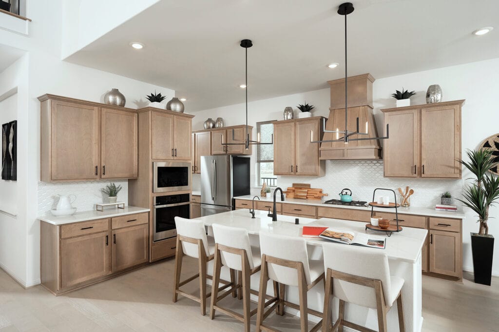 A_Kitchen_With_Wooden_Cabinets_and_a_Cen_5