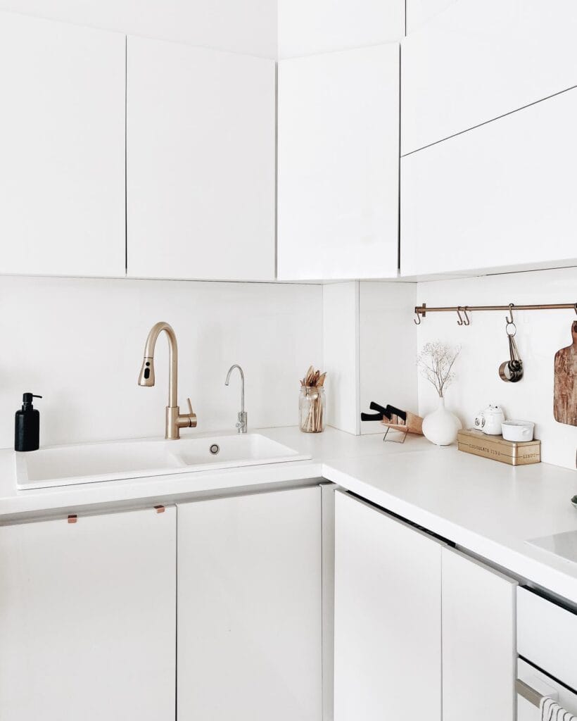 A_Minimalist_White_Kitchen_with_Matching_1