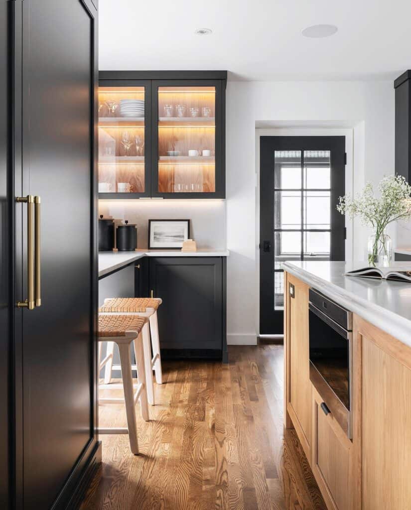 A_Modern_Kitchen_With_Sleek_Black_Cabine_7