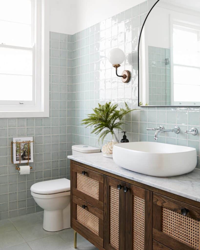 A_Serene_Bathroom_With_Light_Blue_Tiled__4