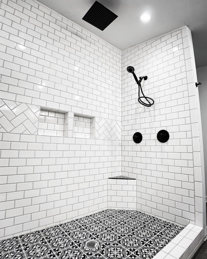 A_Shower_with_Black_and_White_Tiled_Wall_