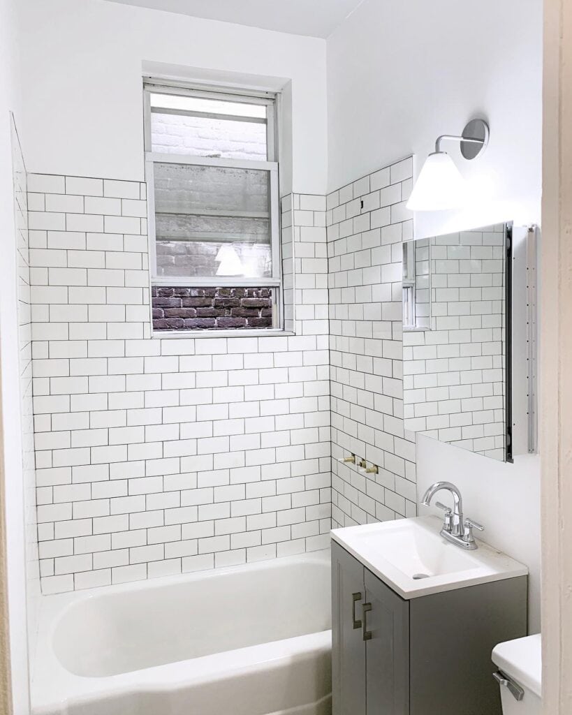 A_Stunning_White_Subway_Tiled_Bathroom_w_