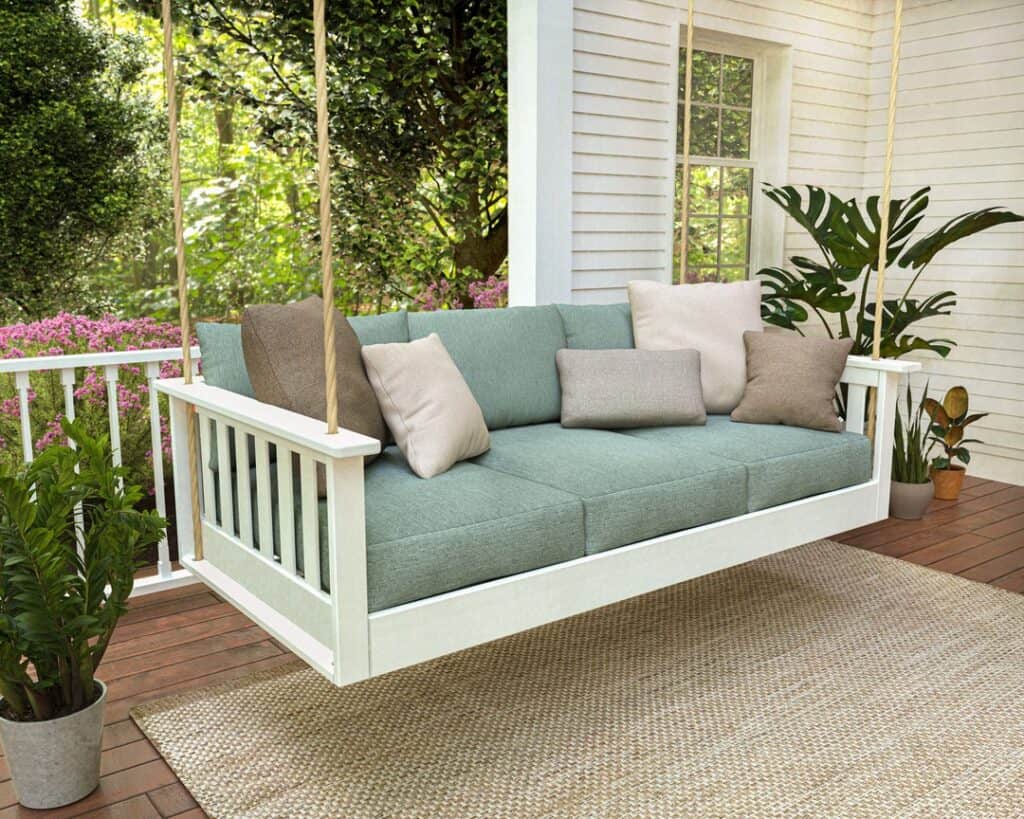 A_Charming_Porch_Swing_Adorned_with_Cozy_