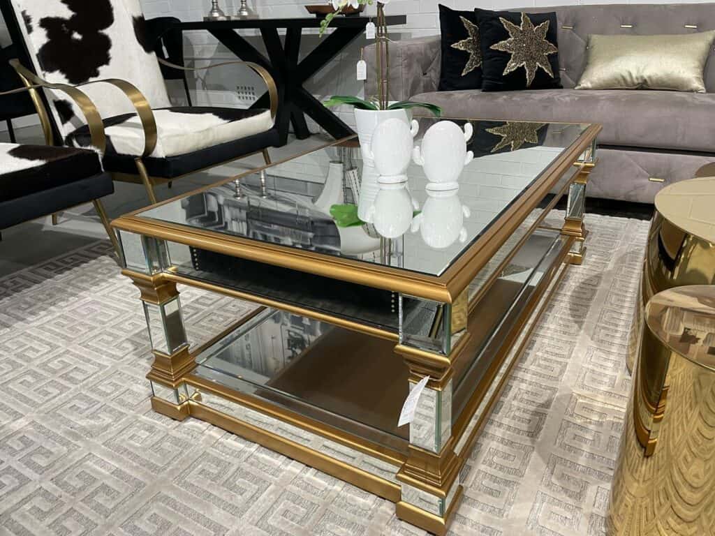 A_Luxurious_Gold_Coffee_Table_With_a_Mir_2