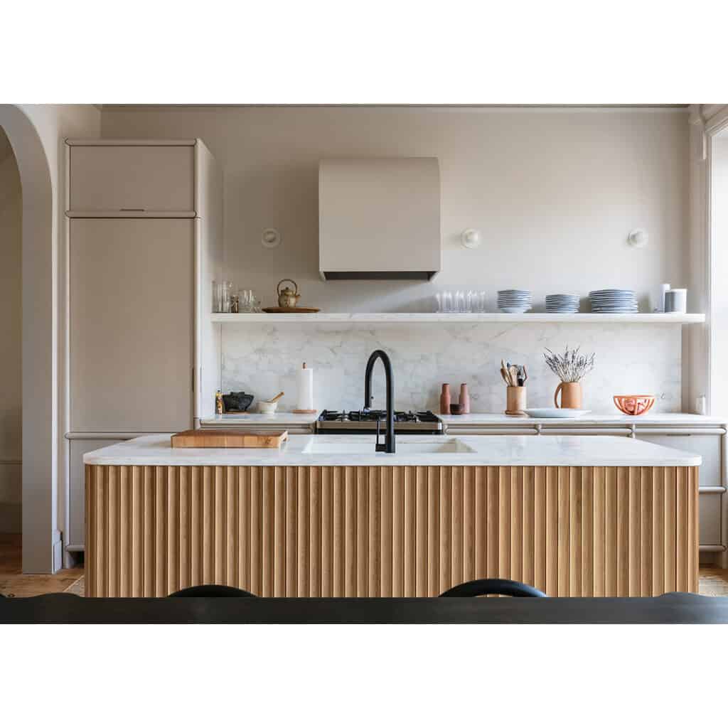 A_Modern_Wooden_Kitchen_Island_with_a_Bu_3