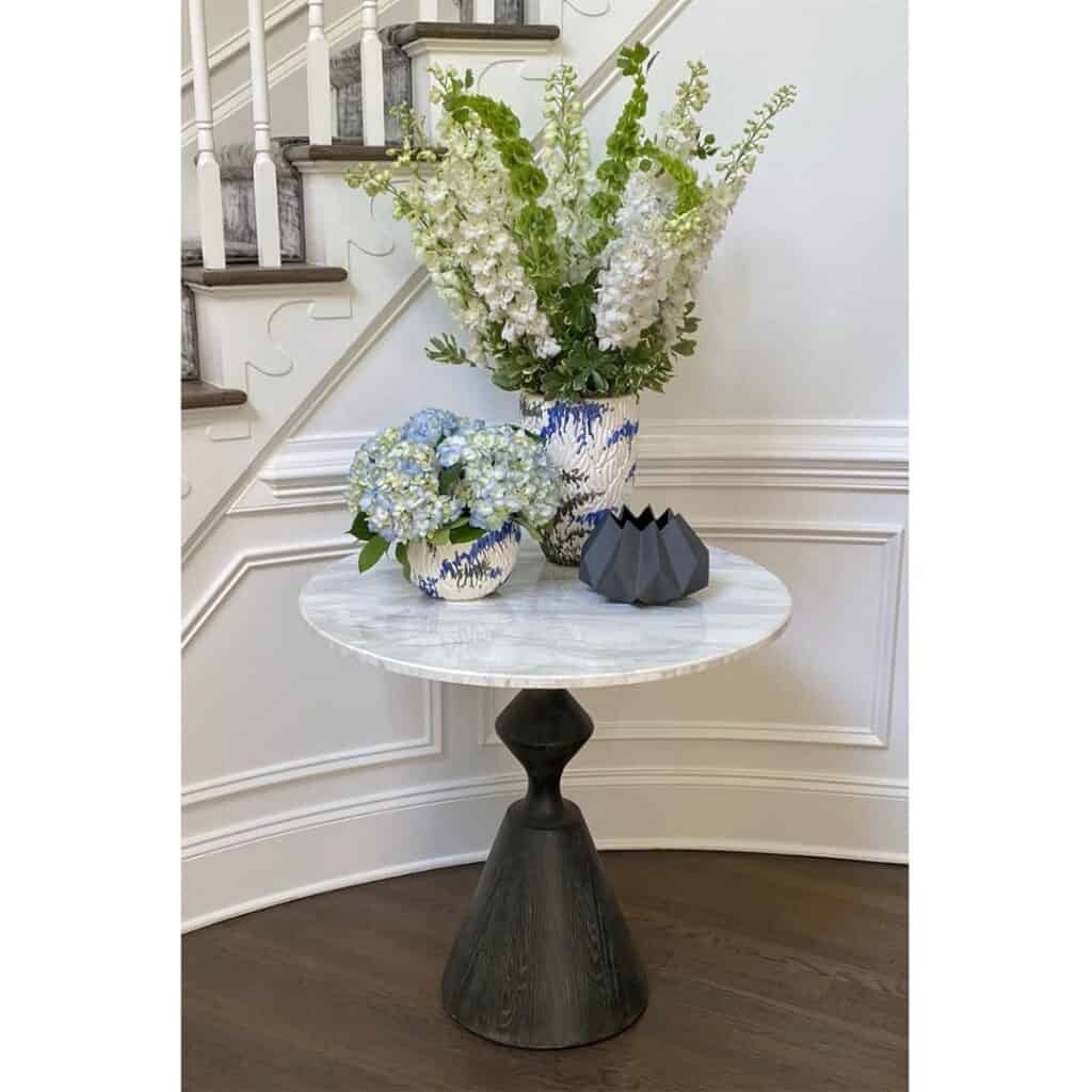 A_Stylish_Pedestal_End_Table_Adorned_wit_4