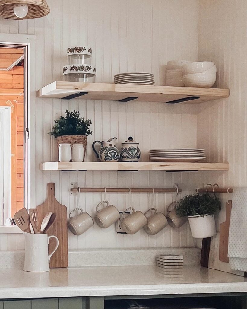 Chic_White_Kitchen_with_Light_Wood_Float_1