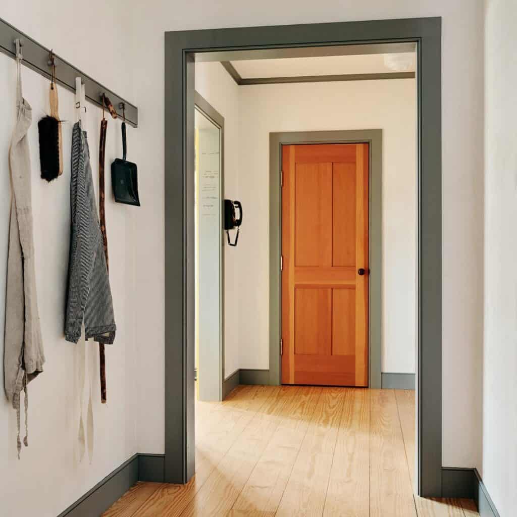 Stylish_Entryway_with_Coats_Hanging_on_H_