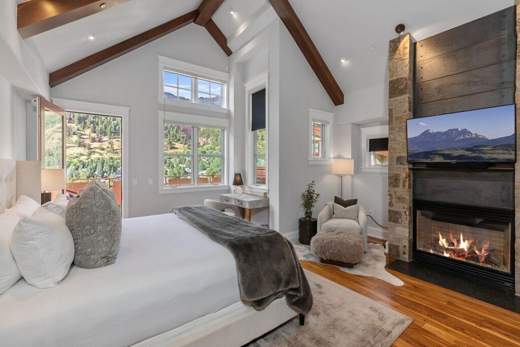 A_Cozy_Bedroom_Retreat_with_a_Fireplace__3