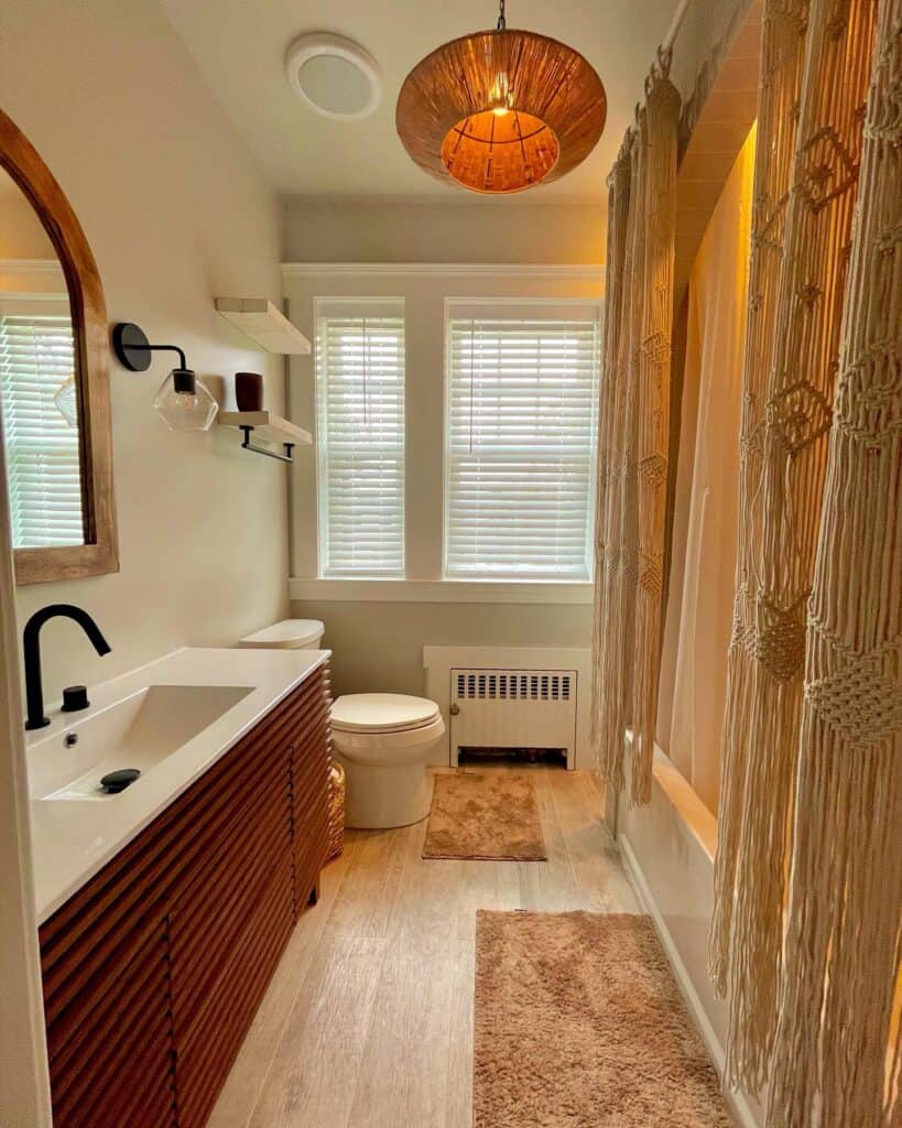 Boho_Bathroom_with_Light_Wood_Flooring_a_